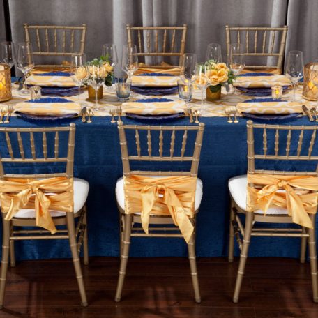 Daffodil Miramar Table Runner and Napkins show over Lapis Contour Table Linen