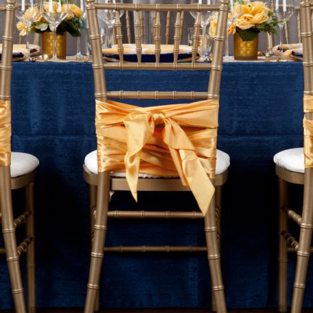 Daffodil Miramar Table Runner and Napkins show over Lapis Contour Table Linen