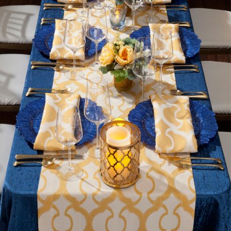 Daffodil Miramar Table Runner and Napkins show over Lapis Contour Table Linen