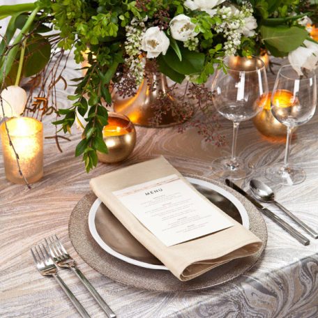 Magma Table Linen with a Lino Ginger Glitter Charger and Stone Shantung Napkin