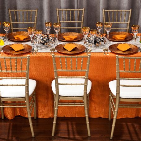 Mandarin Rhythm Table Linen with White Calypso Table Runner