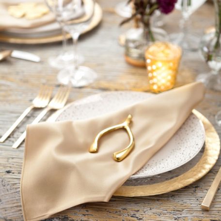 Pyrite Marble Table Linen with our Ice with Gold Rimmed Charger topped off with a Gold Lamour Napkin