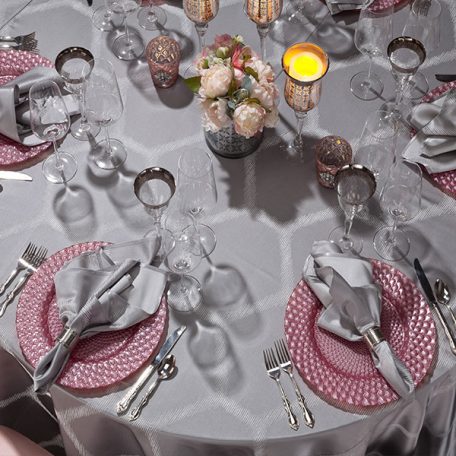 Silver Apiary Table Linen with Pink Luxe Glass Charger and Silver Apiary Dinner Napkin