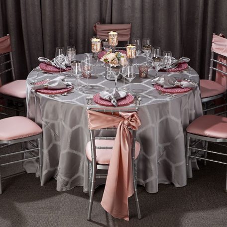 Silver Apiary Table Linen. Silver Chiavari Chair with Pink Champagne Lamour Chair Sash and Chair Pad cover.