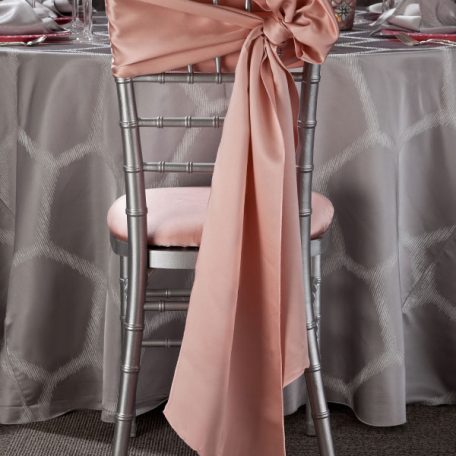 Silver Apiary Table Linen. Silver Chiavari Chair with Pink Champagne Lamour Chair Sash and Chair Pad cover.