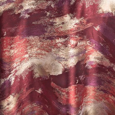 The swirling pattern and vibrant color mix of Ruby Allure Table Linen hint at glamour and a daring spirit. Combining tones of scarlet, ruby and deep red-purple with hints of metallic gold, this shimmering pattern is imbued with life and verve. You can rent this linen and many others in our Envie Collection here at FE.