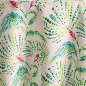 Sanibel, a patterned linen, features a delicate tracery in shades of assorted island greens with vibrant pops of cerise. Part of the Palm Beach Chic collection, Sanibel is powerful enough to be the only pattern in the room or mixed in with other patterns. Shop the entire collection today!