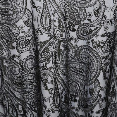 Rent paisley lace overlays from Fabulous Events. We have one of the largest selections of rental table linens, chair covers, napkins & chargers.