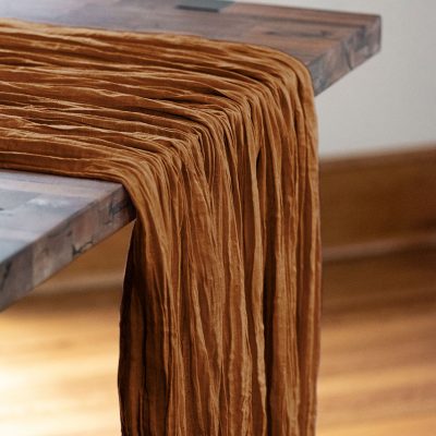 Rent our Rust Sahara Table Drape for your special event.